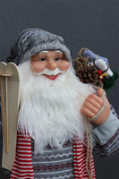 duża figurka / miękki stojący Mikołaj z nartami i szalikiem