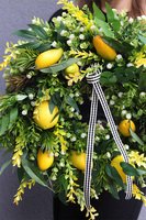Citrones, zielony wianek na drzwi z owocami