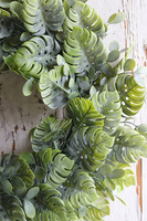 Monstera, zielony wianek na drzwi z liśćmi