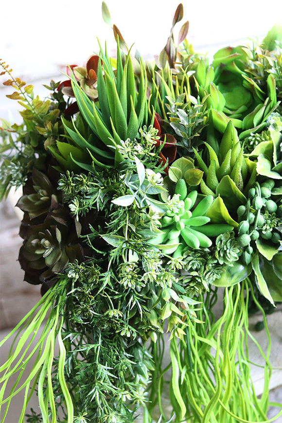 Anya Long Sukulenty, zielona kompozycja w srebrnej donicy, wym.30x58cm  